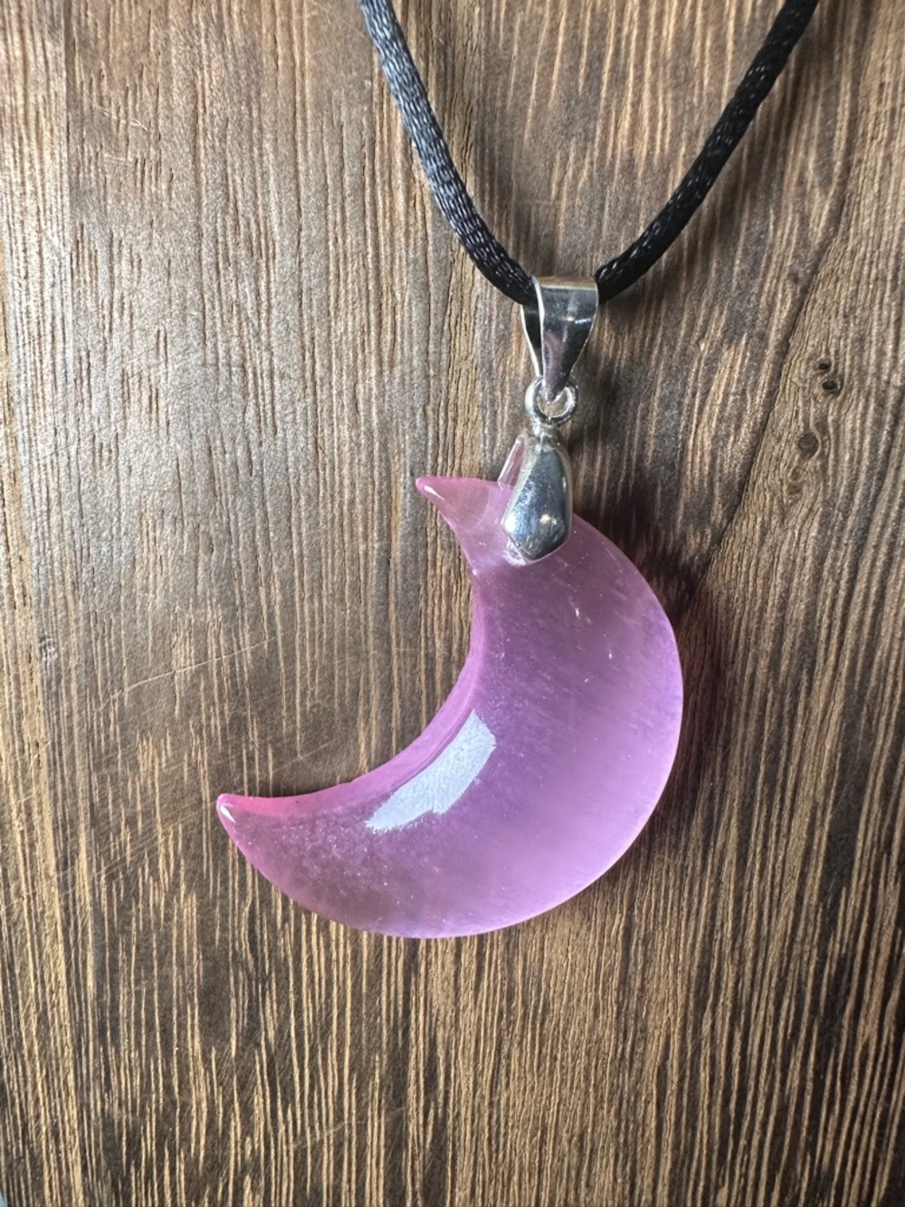 Pink Satin Spar Crescent Moon Pendant Necklace on Black Rope